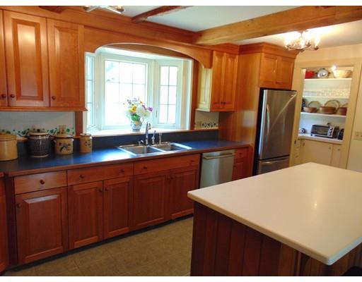 38 Richmond Road Freetown, MA 02702 - Photo 11 of 30 a kitchen with stainless steel appliances wooden cabinets a sink and a refrigerator