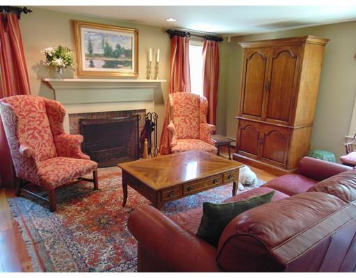 38 Richmond Road Freetown, MA 02702 - Photo 15 of 30 a living room with furniture a fireplace and a window