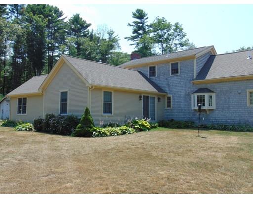 38 Richmond Road Freetown, MA 02702 - Photo 5 of 30 a front view of a house with a garden
