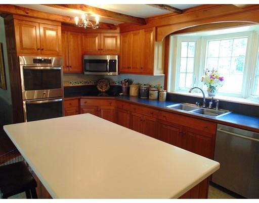 38 Richmond Road Freetown, MA 02702 - Photo 10 of 30 a kitchen with granite countertop a sink a stove top oven a granite counter top and stainless steel appliances