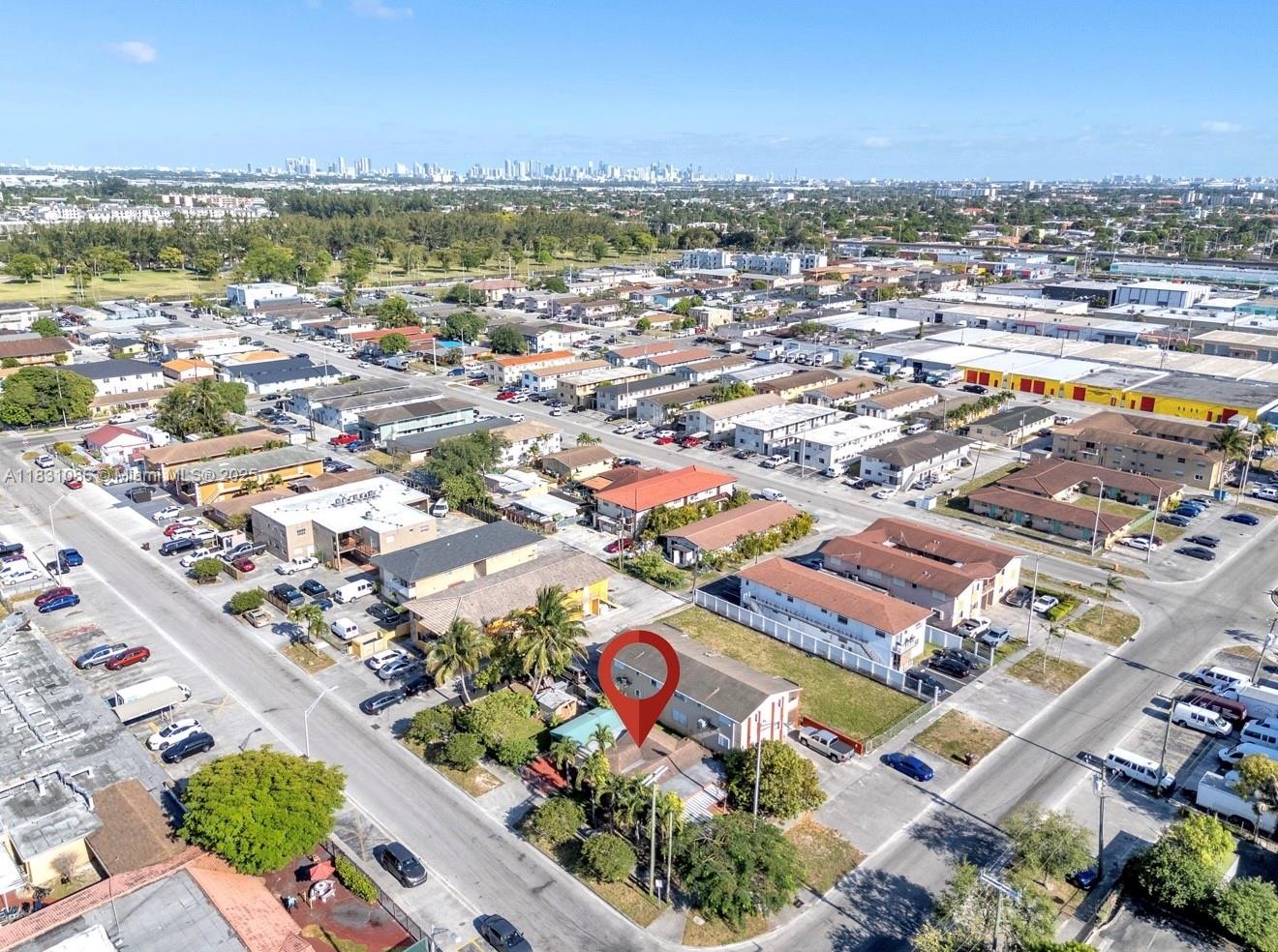 190 West 27th Street Hialeah, FL 33010 - Photo 5 of 7 an aerial view of residential houses with outdoor space