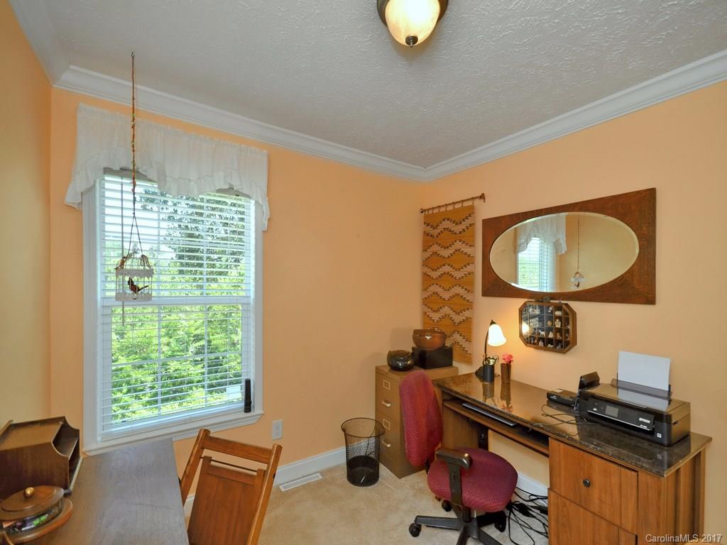 141 Ingram Loop Clyde, NC 28721 - Photo 11 of 16 a view of a workspace room with a window