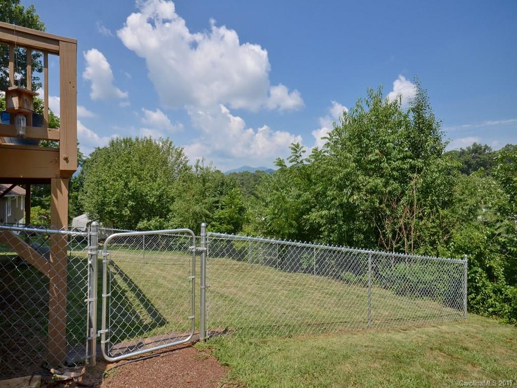 141 Ingram Loop Clyde, NC 28721 - Photo 15 of 16 a view of a tennis court