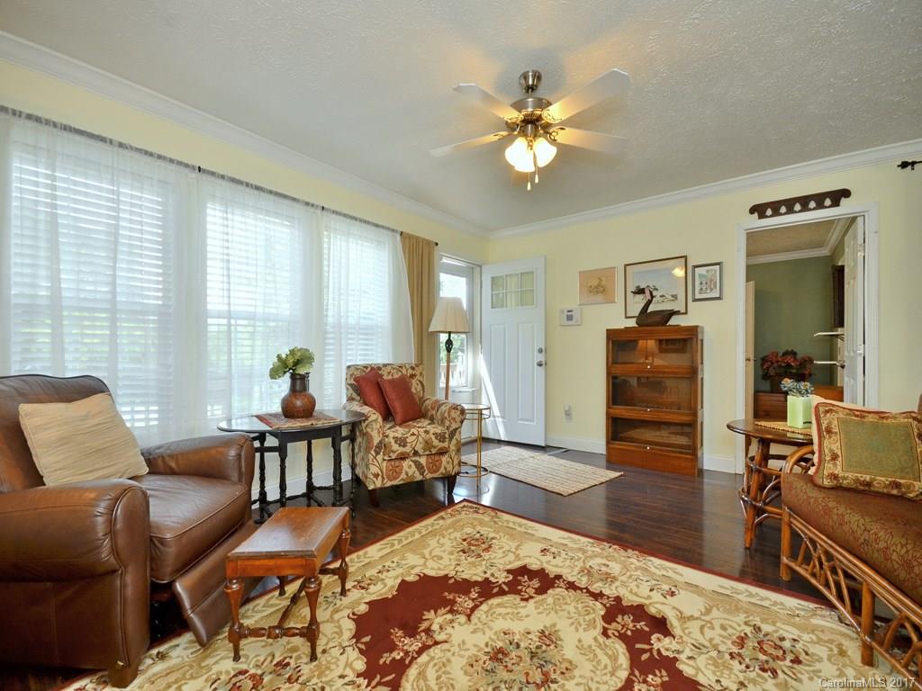 141 Ingram Loop Clyde, NC 28721 - Photo 3 of 16 a living room with furniture and wooden floor