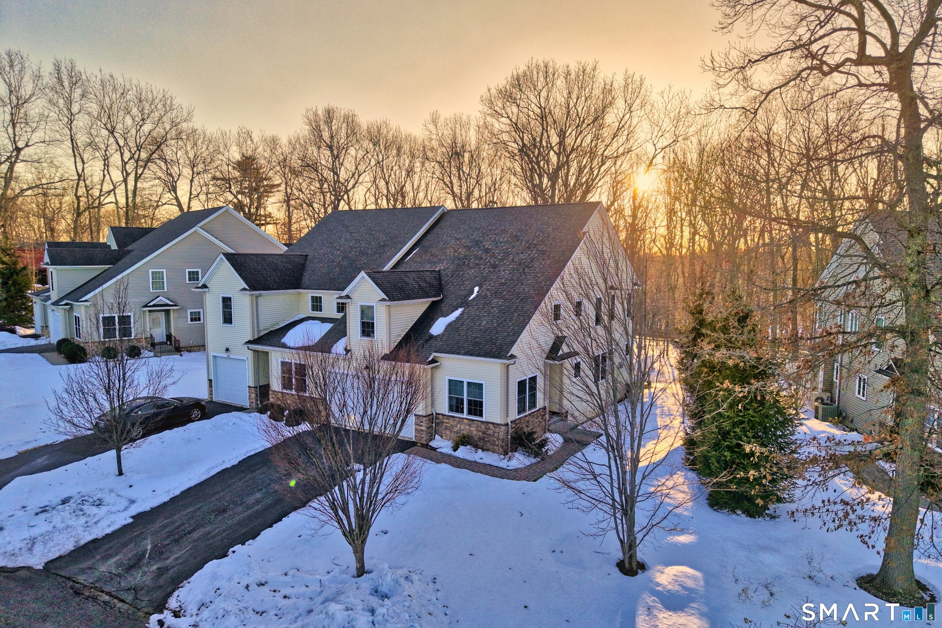 101 Turtlebrook Lane, Unit 101 Bristol, CT 06010 - Photo 11 of 48 a view of house with yard and outdoor seating
