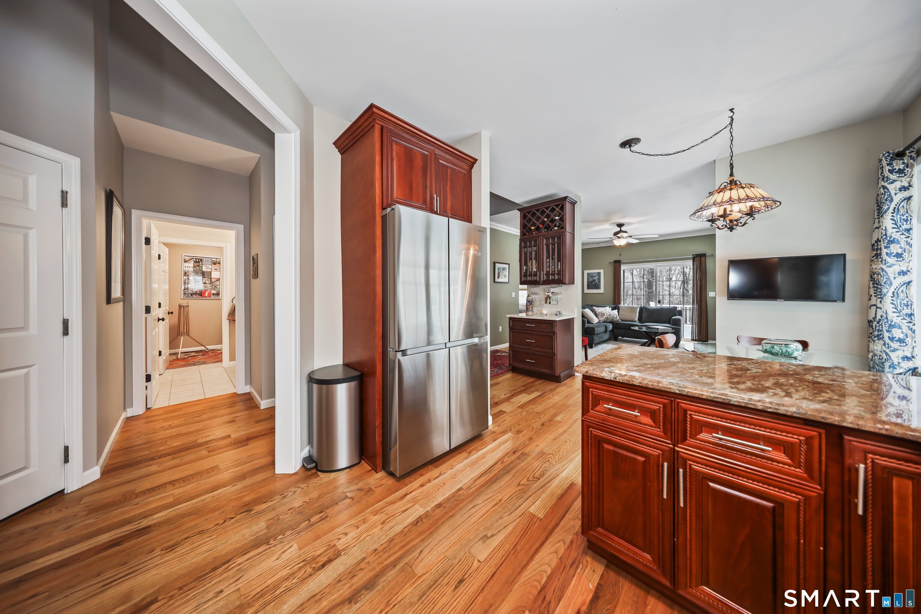 101 Turtlebrook Lane, Unit 101 Bristol, CT 06010 - Photo 22 of 48 a kitchen with stainless steel appliances granite countertop a refrigerator and a sink