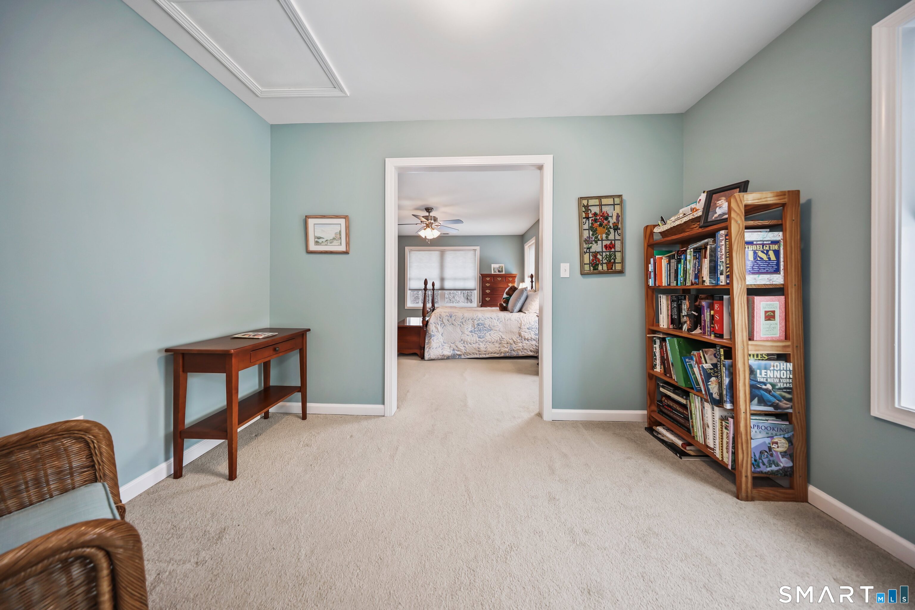 101 Turtlebrook Lane, Unit 101 Bristol, CT 06010 - Photo 33 of 48 a view of a livingroom with furniture and cabinet