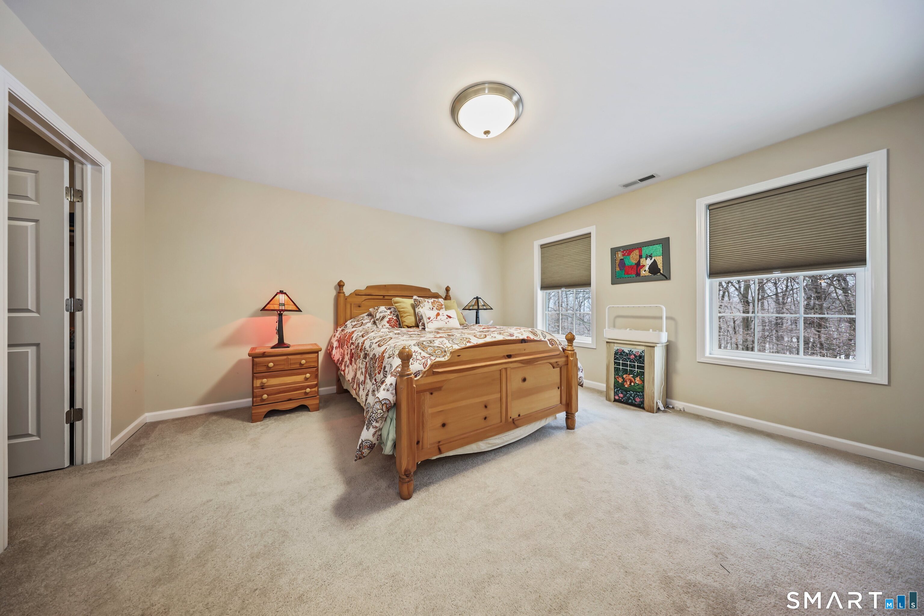 101 Turtlebrook Lane, Unit 101 Bristol, CT 06010 - Photo 34 of 48 a bedroom with a bed and a window