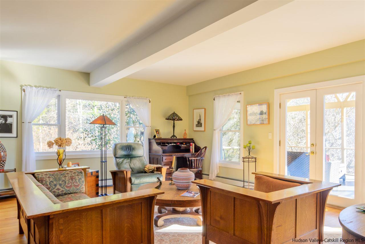 11 Sherman Road Woodstock, NY 12498 - Photo 13 of 19 a room with furniture and large windows