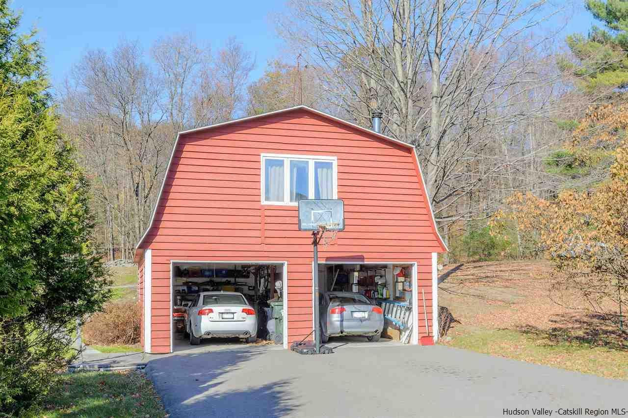 11 Sherman Road Woodstock, NY 12498 - Photo 18 of 19 a view of a house with a yard and garage