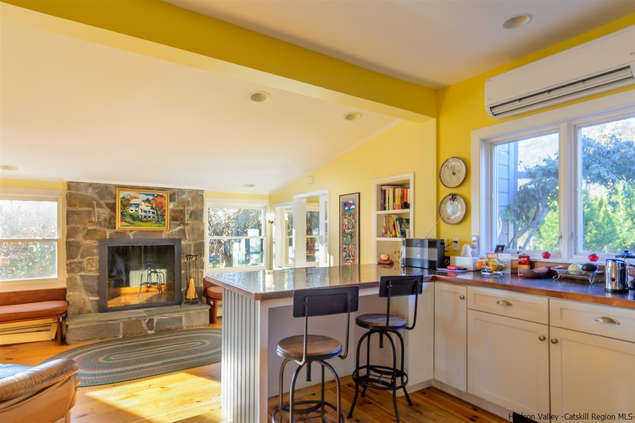 11 Sherman Road Woodstock, NY 12498 - Photo 3 of 19 a living room with furniture and a large window