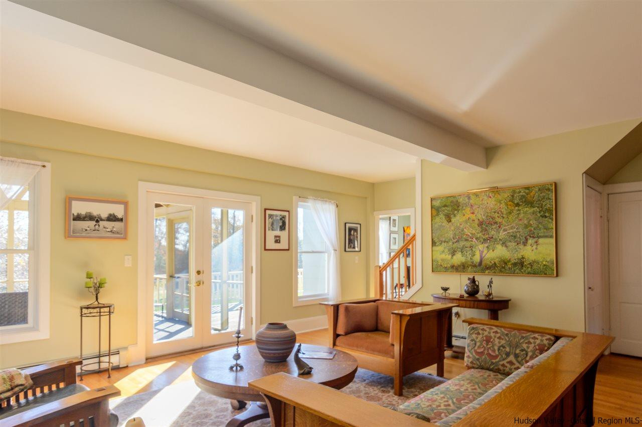11 Sherman Road Woodstock, NY 12498 - Photo 6 of 19 a living room with furniture and a large window
