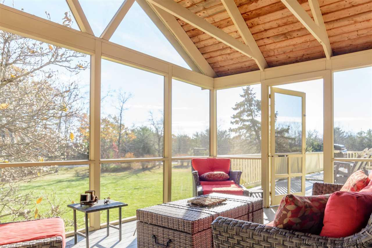 11 Sherman Road Woodstock, NY 12498 - Photo 7 of 19 a living room with furniture and floor to ceiling windows