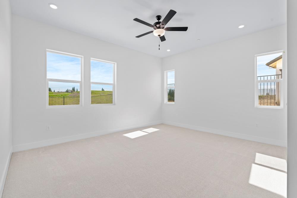 14854 Grace Warren Way Rancho Murieta, CA 95683 - Photo 22 of 27 a view of an empty room with a window
