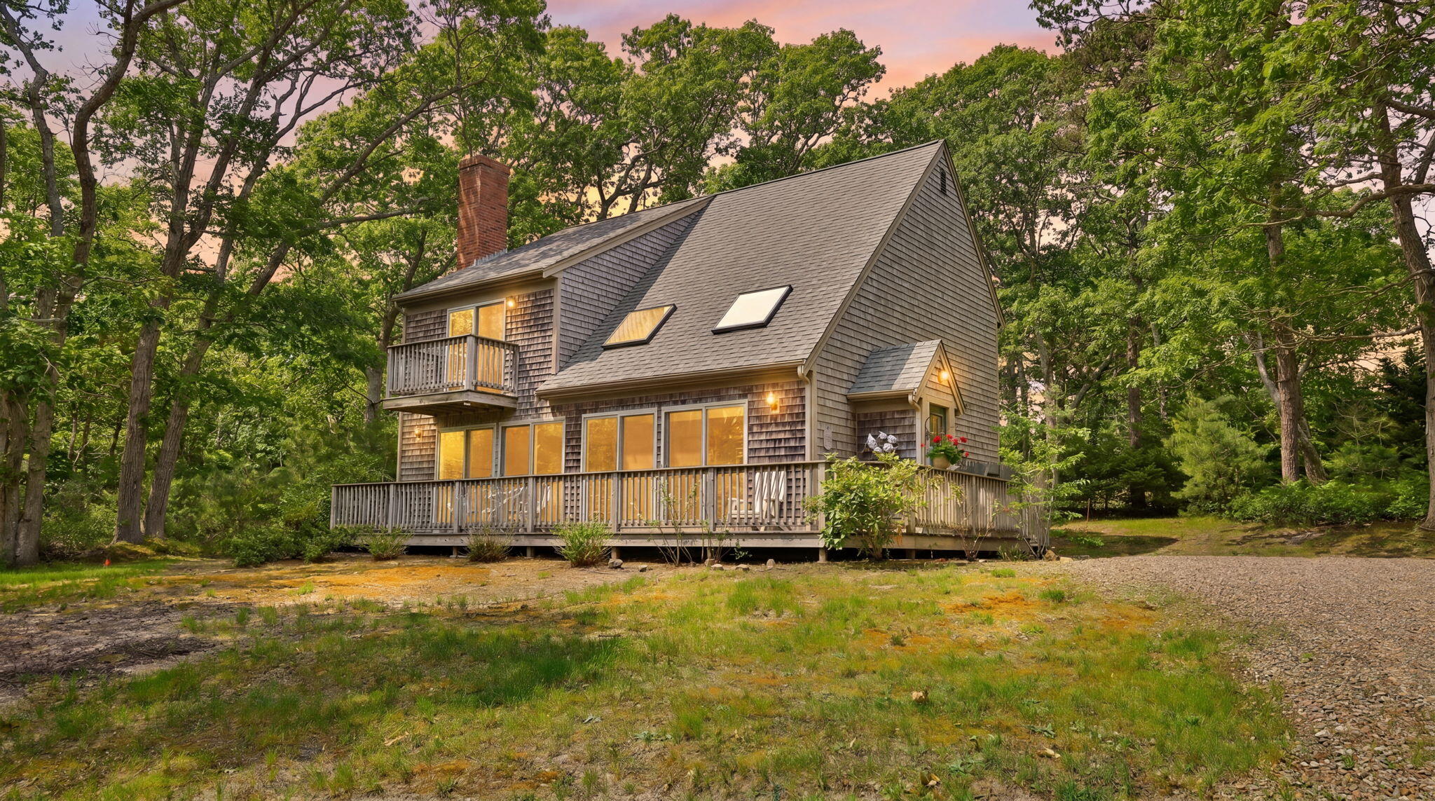 285 Blue Heron Road Wellfleet, MA 02667 - Photo 31 of 31 a front view of a house with a yard