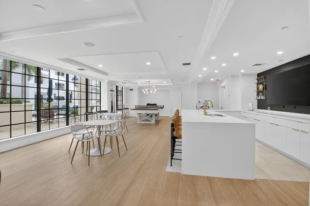 a view of a dining room with furniture and window