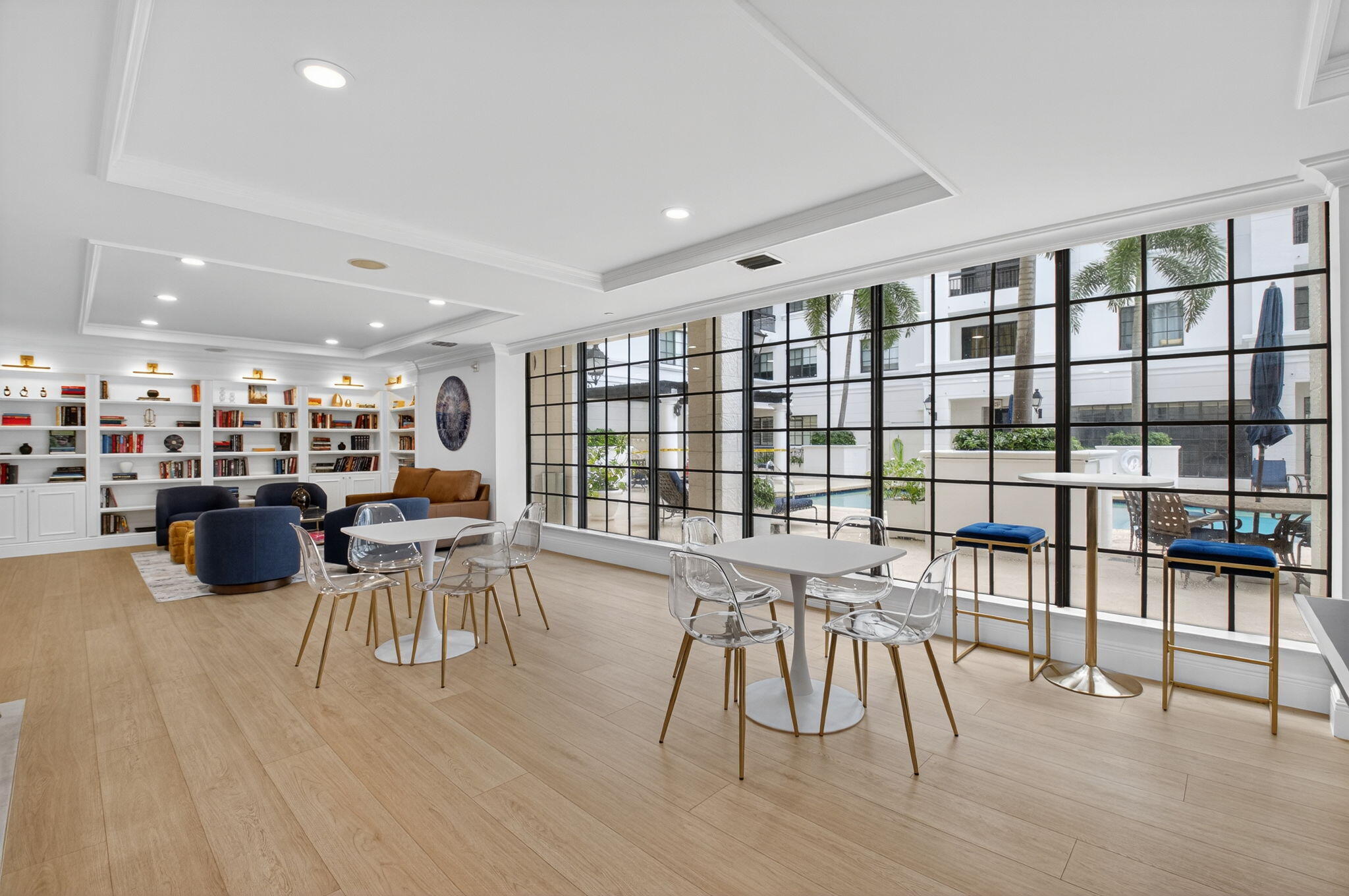 233 South Federal Highway, Unit 721 Boca Raton, FL 33432 - Photo 23 of 50 a living room with furniture a floor to ceiling window and wooden floor