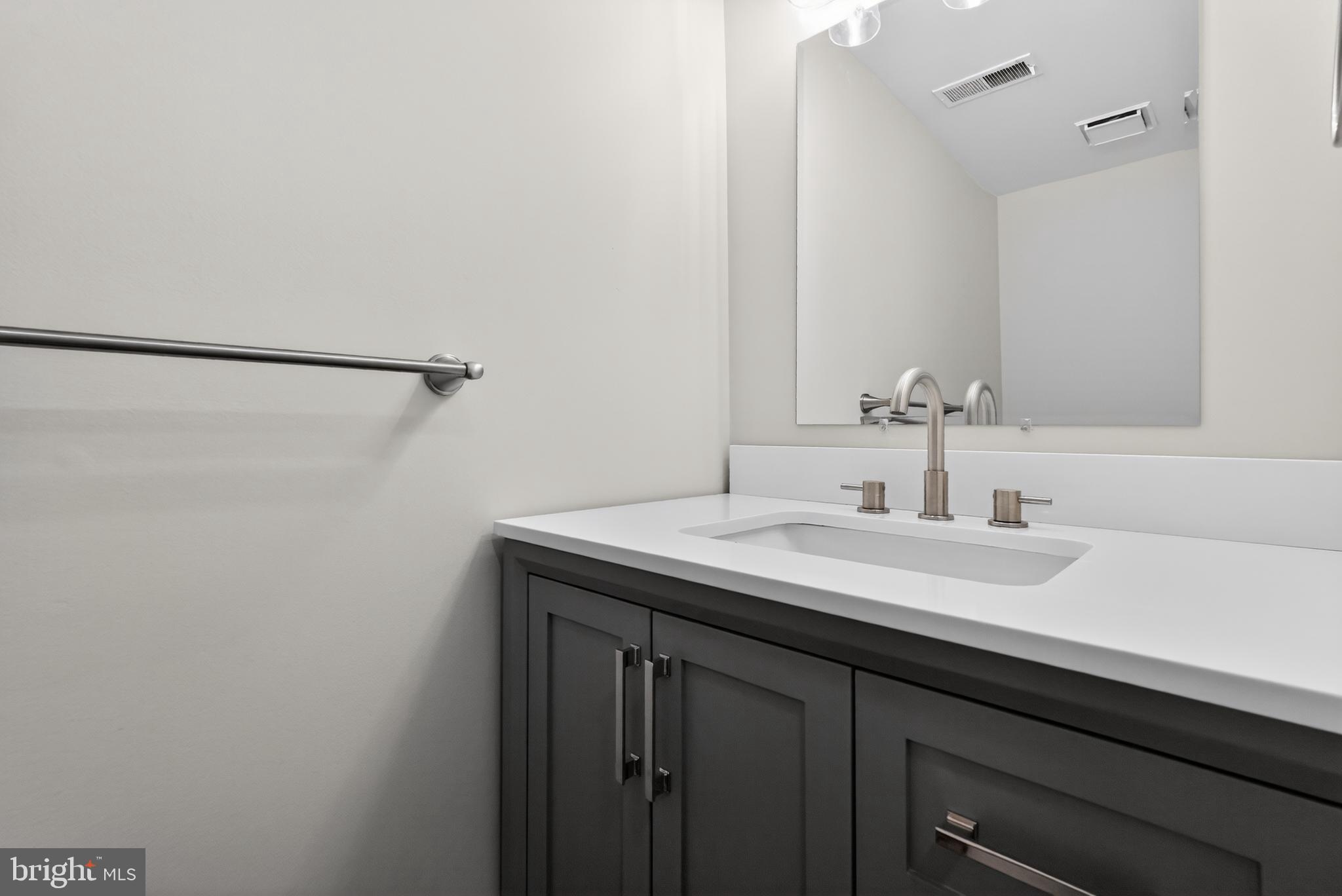 1173 Independence Way Hatfield, PA 19440 - Photo 12 of 26 a bathroom with a sink and a mirror