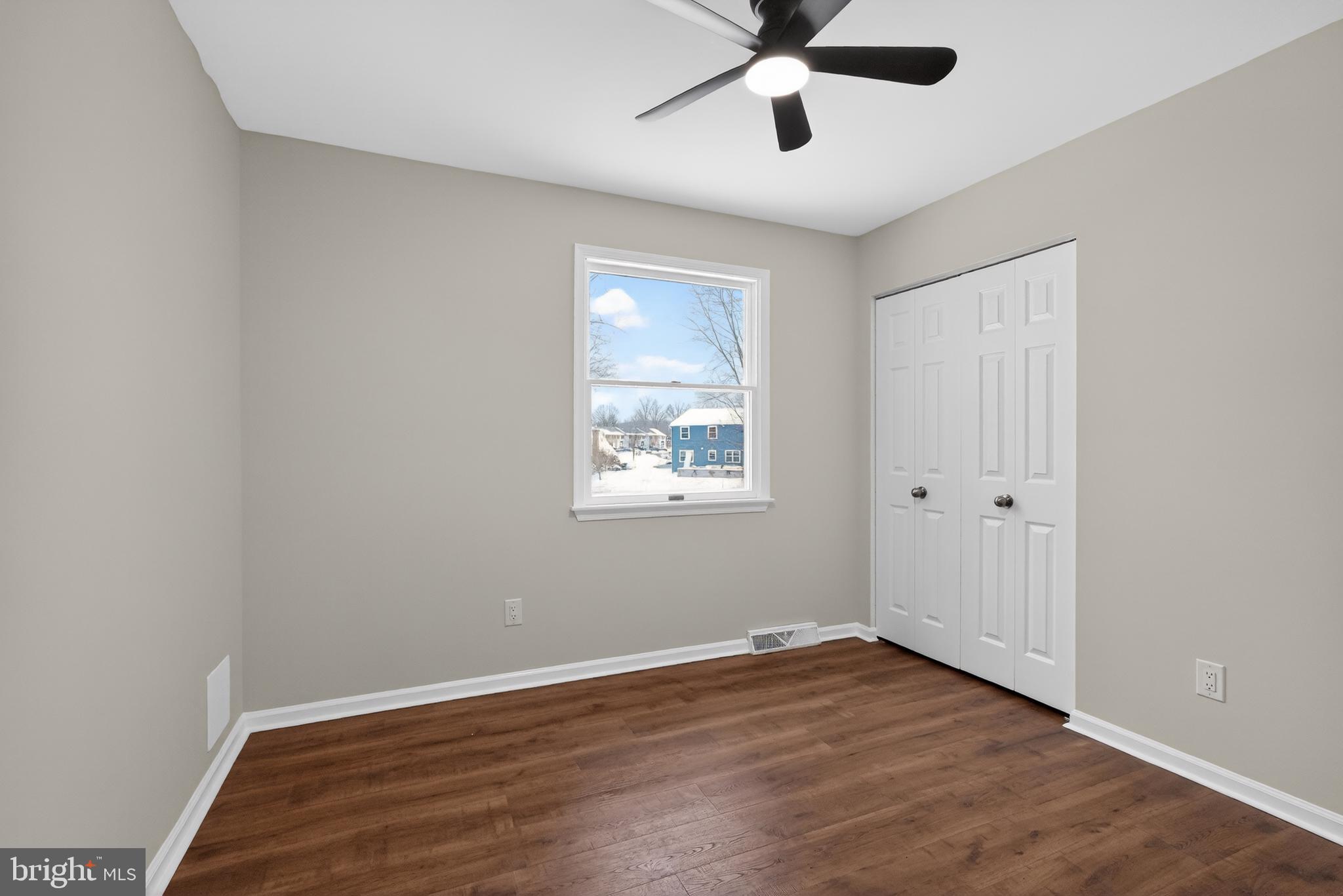 1173 Independence Way Hatfield, PA 19440 - Photo 14 of 26 an empty room with wooden floor fan and windows