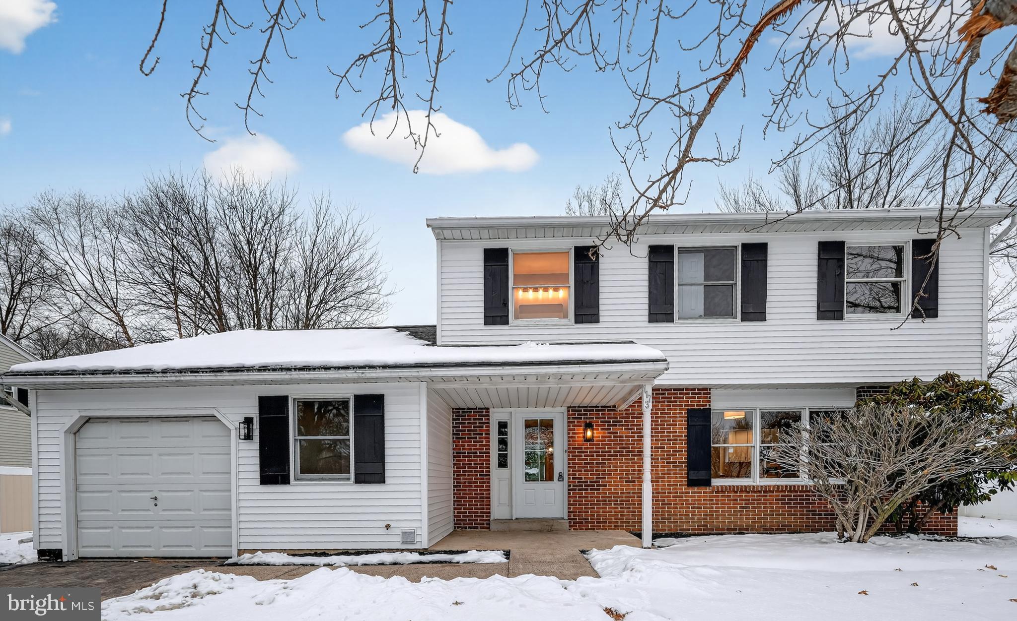1173 Independence Way Hatfield, PA 19440 - Photo 2 of 26 a view of a white house with a large tree