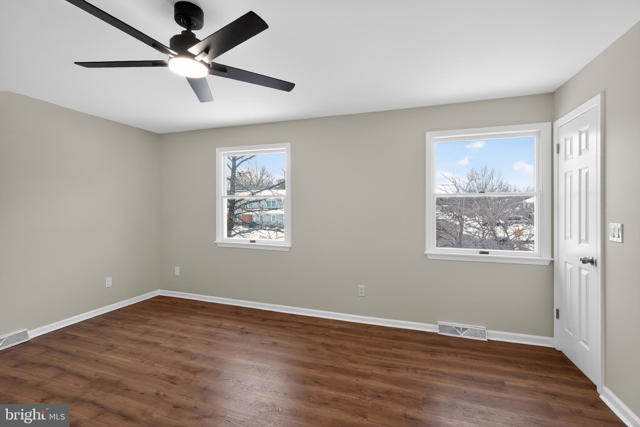 1173 Independence Way Hatfield, PA 19440 - Photo 21 of 26 a view of an empty room with wooden floor and a window