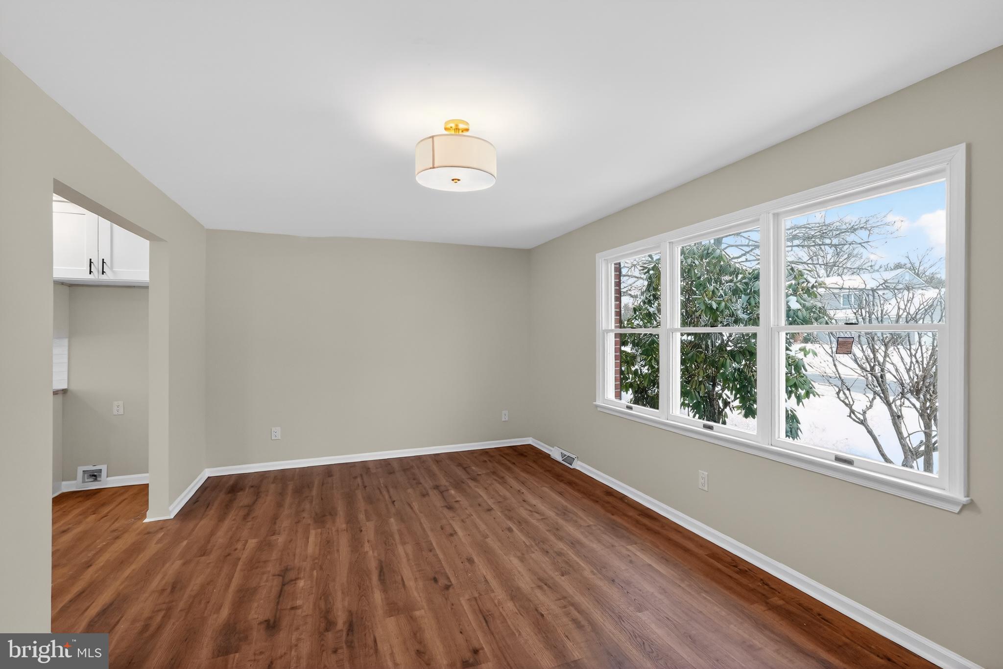 1173 Independence Way Hatfield, PA 19440 - Photo 4 of 26 wooden floor in an empty room with a window