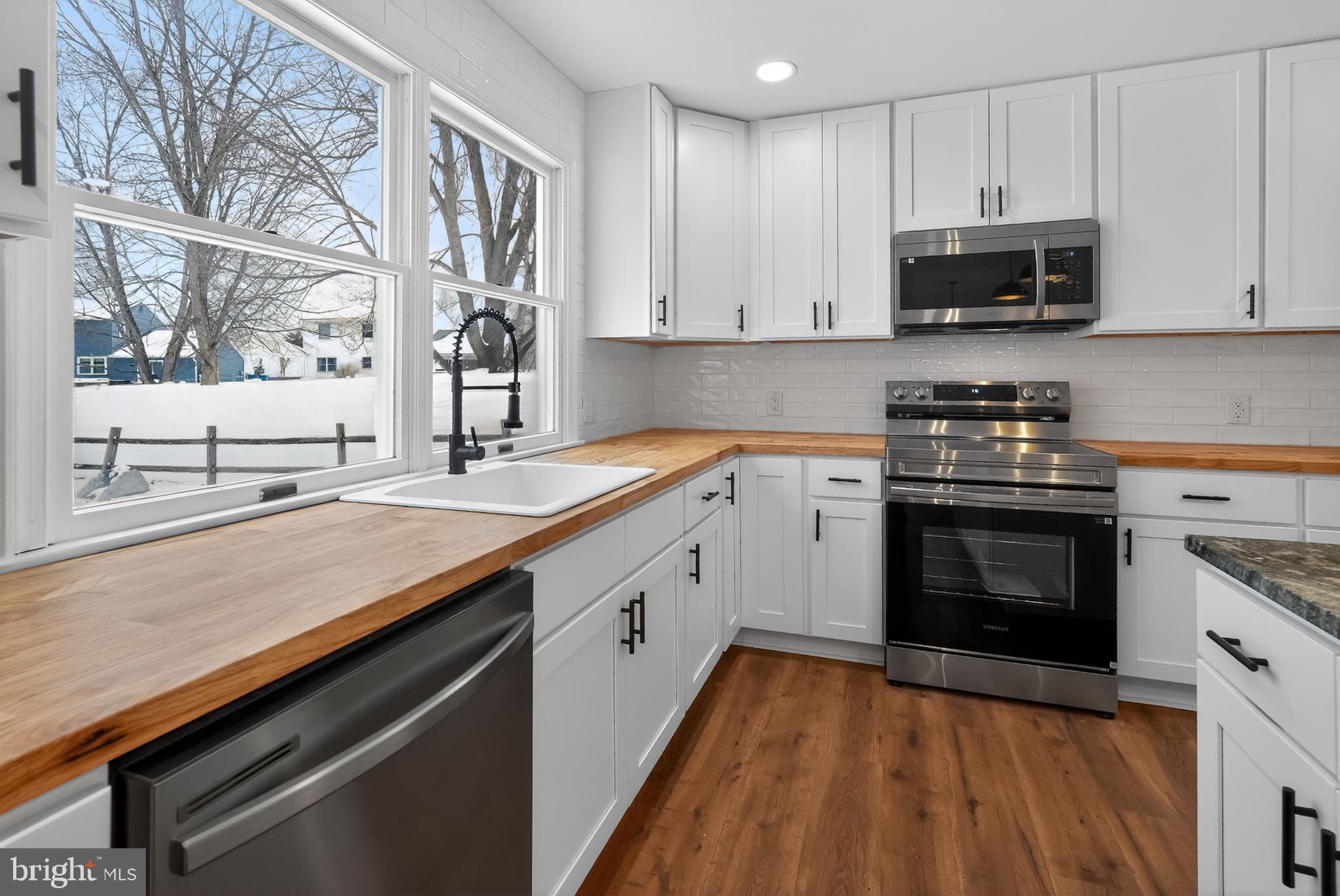 1173 Independence Way Hatfield, PA 19440 - Photo 7 of 26 a kitchen with a sink stove and microwave