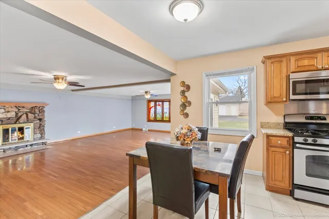 a dining room with furniture and window