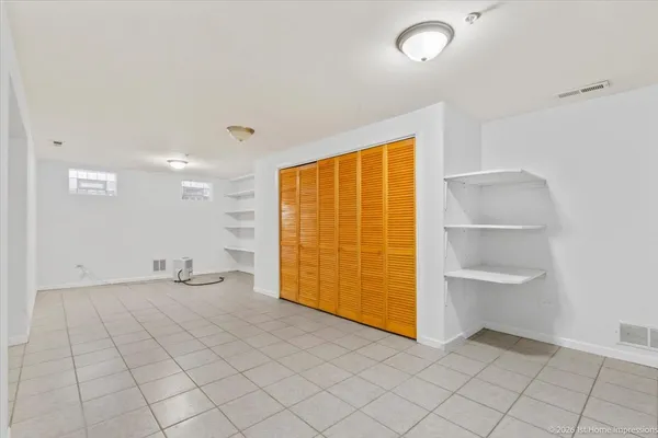 an empty room with closet