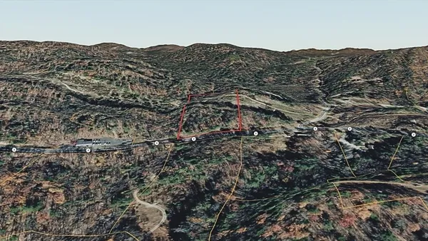 a view of mountains and valleys