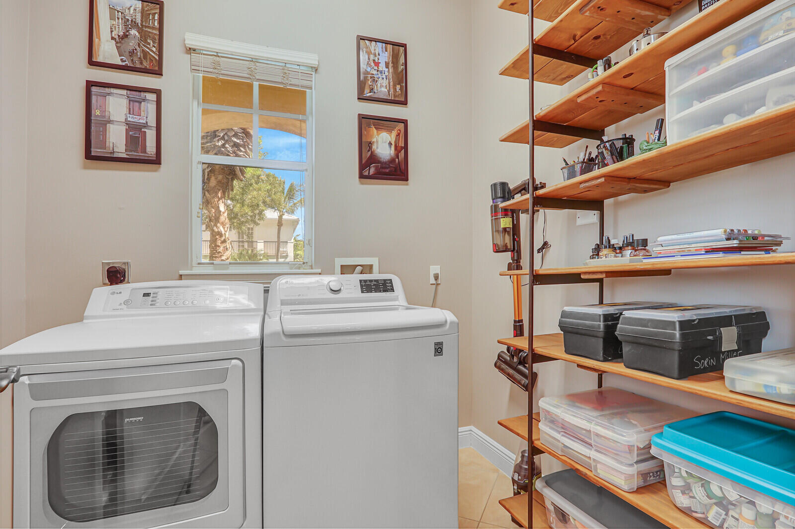 122 Inkberry Drive Jupiter, FL 33458 - Photo 37 of 56 a utility room with dryer and washer