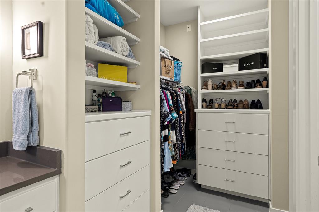 5921 Hiline Road, Unit 2404 Austin, TX 78734 - Photo 25 of 36 a view of walk in closet with clothes and shoes