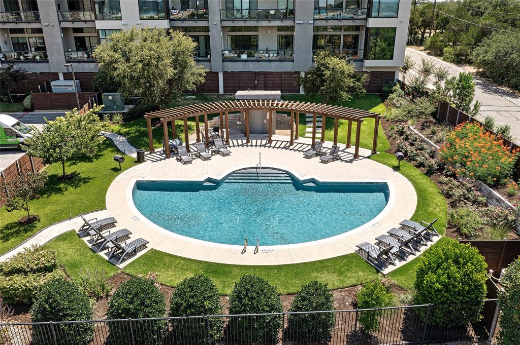 5921 Hiline Road, Unit 2404 Austin, TX 78734 - Photo 35 of 36 a view of a swimming pool with a patio