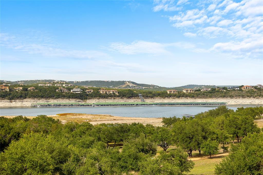 5921 Hiline Road, Unit 2404 Austin, TX 78734 - Photo 4 of 36 a view of a lake and a mountain