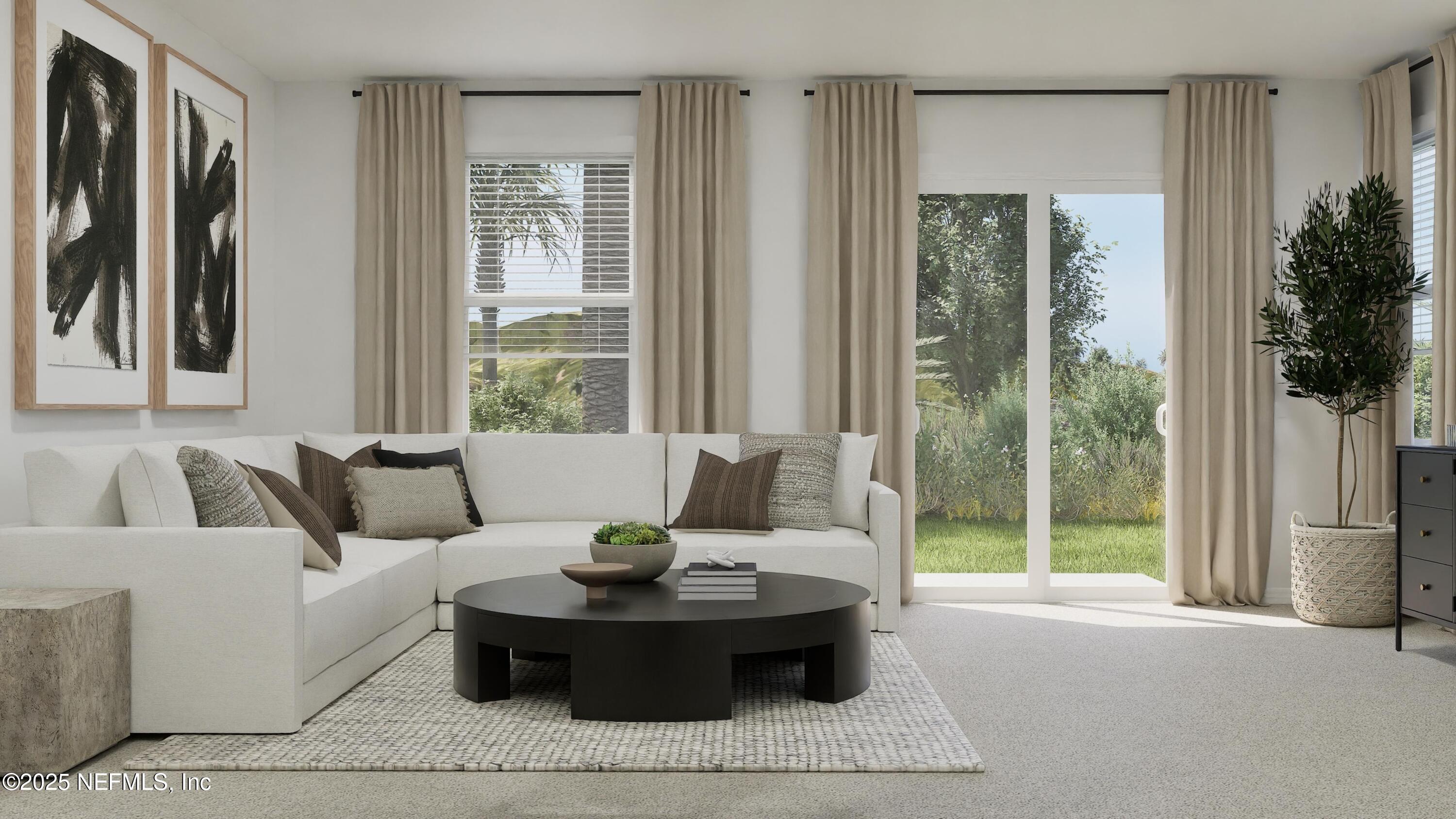 3963 Mid Century Street Jacksonville, FL 32217 - Photo 12 of 22 a living room with furniture and a large window