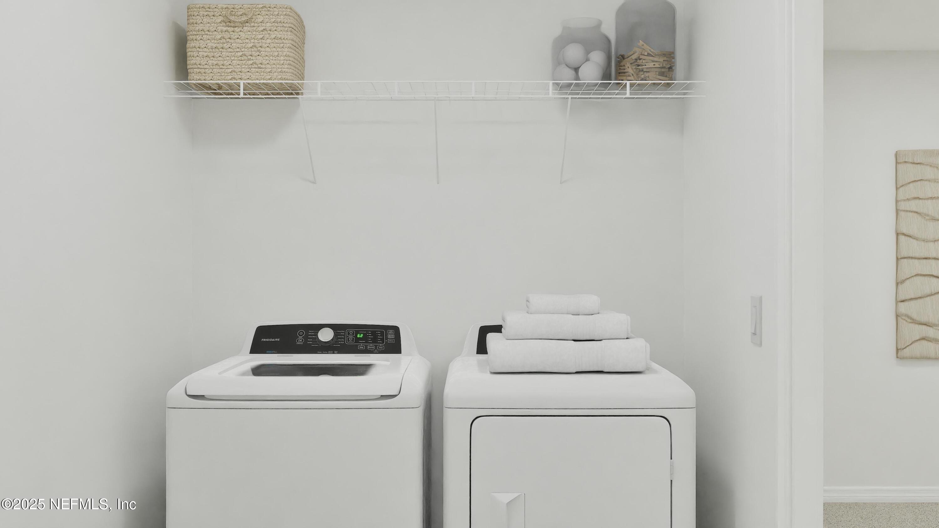 3963 Mid Century Street Jacksonville, FL 32217 - Photo 15 of 22 a utility room with dryer and washer