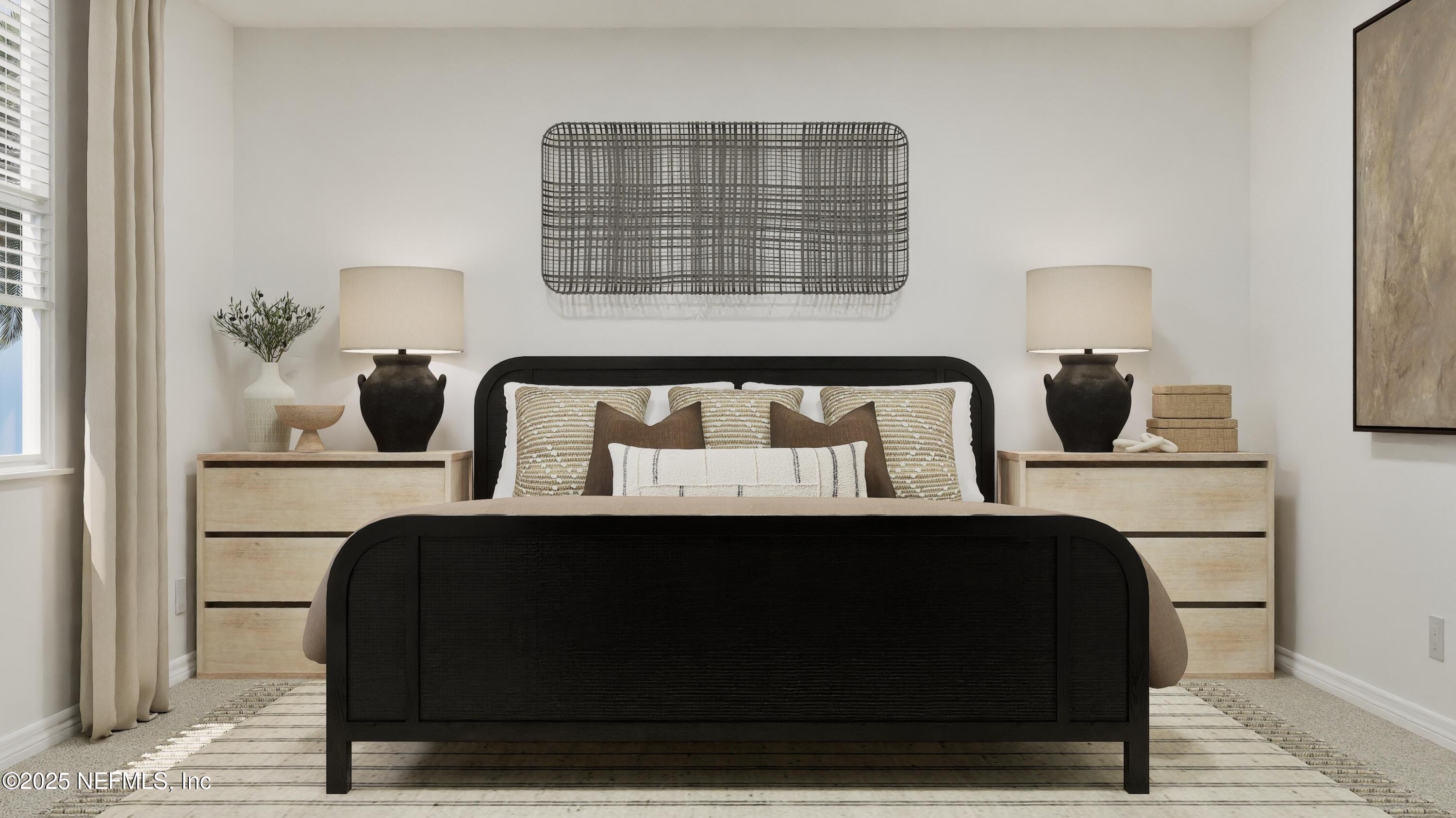 3963 Mid Century Street Jacksonville, FL 32217 - Photo 18 of 22 a bedroom with a bed a mirror and lamp