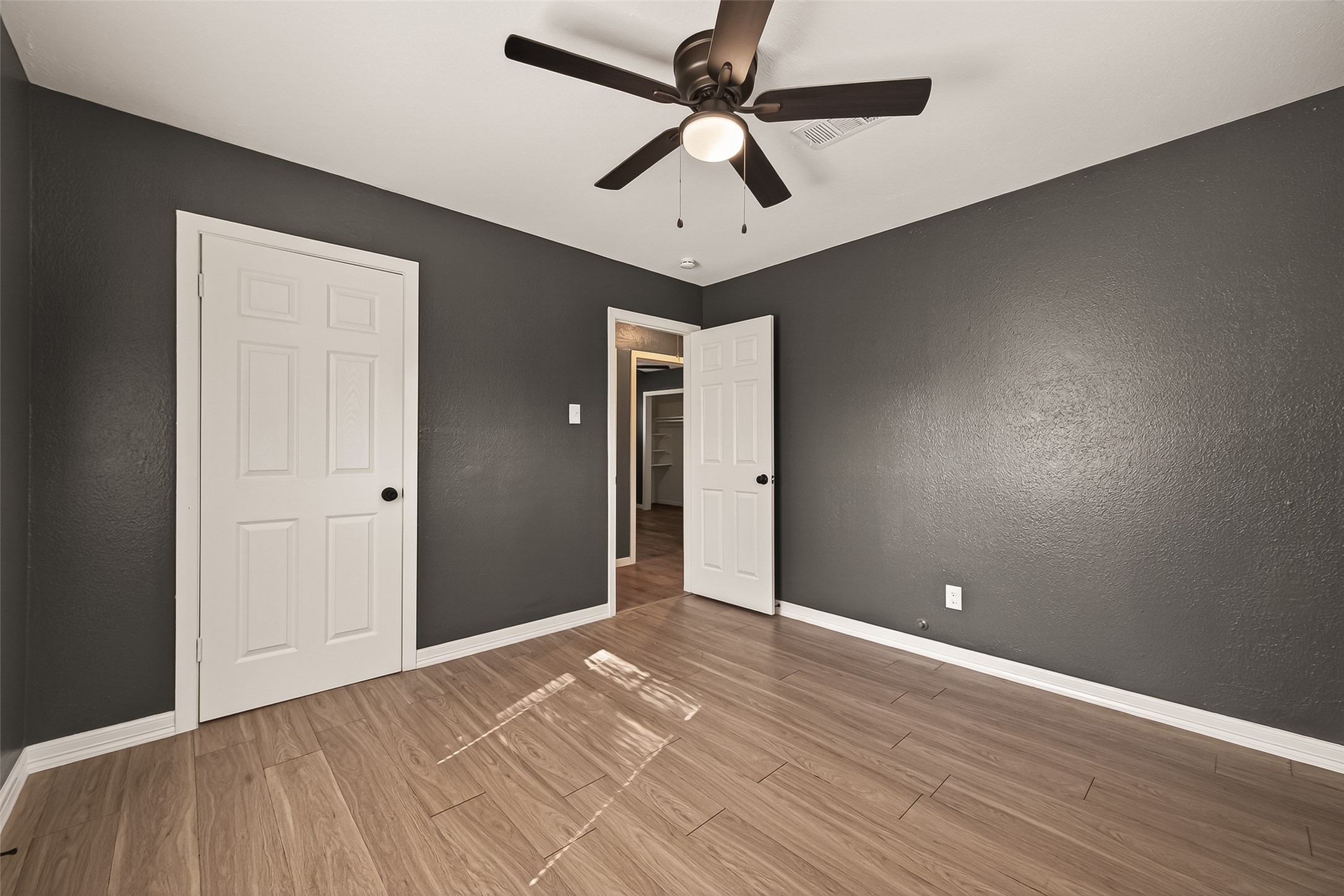 2619 Sinclair Street Pasadena, TX 77503 - Photo 20 of 29 wooden floor in an empty room