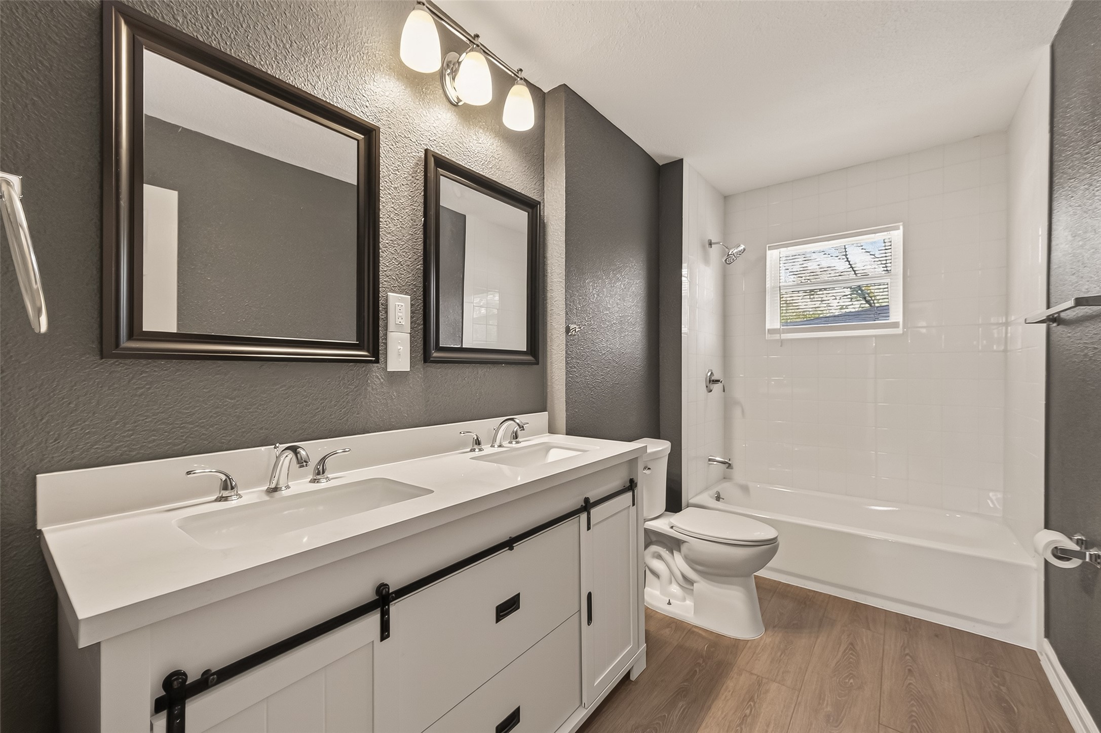 2619 Sinclair Street Pasadena, TX 77503 - Photo 23 of 29 a bathroom with a sink a toilet and shower