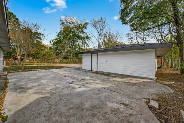 a view of outdoor space with deck and tree