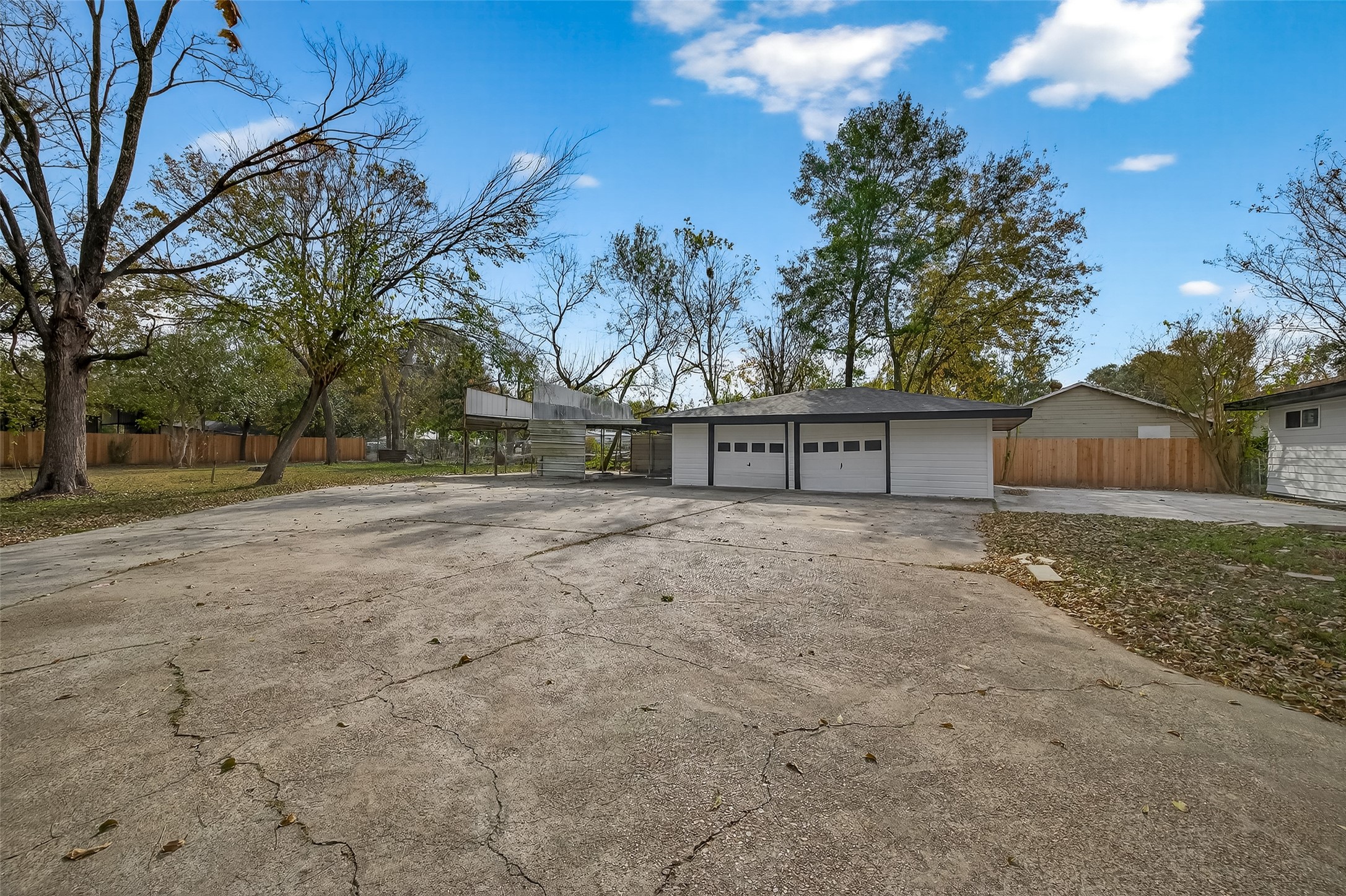 2619 Sinclair Street Pasadena, TX 77503 - Photo 25 of 29 a view of outdoor space with deck and tree