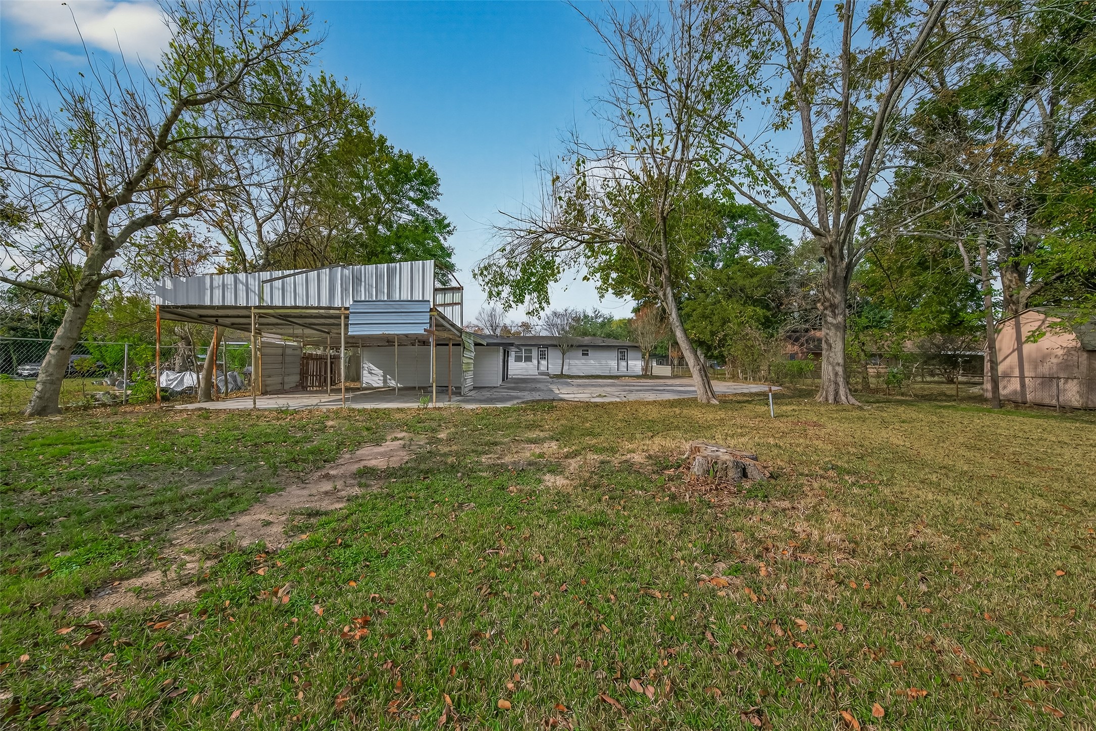 2619 Sinclair Street Pasadena, TX 77503 - Photo 28 of 29 a front view of a house with a yard
