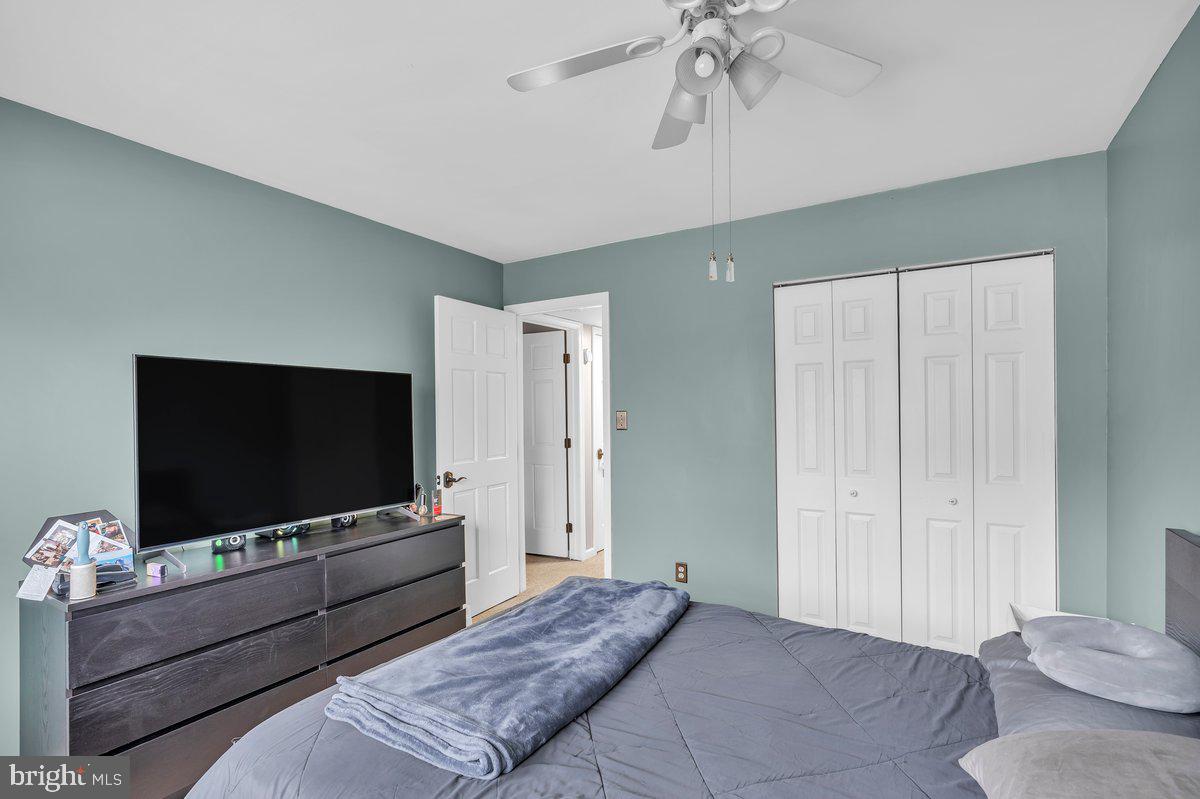 702 Winding Way Westville, NJ 08093 - Photo 17 of 22 a living room with furniture and a flat screen tv