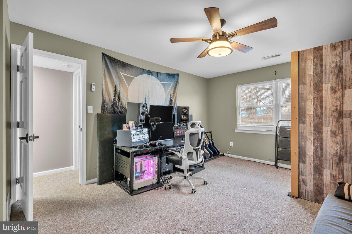 702 Winding Way Westville, NJ 08093 - Photo 18 of 22 a view of a room with workspace and a window