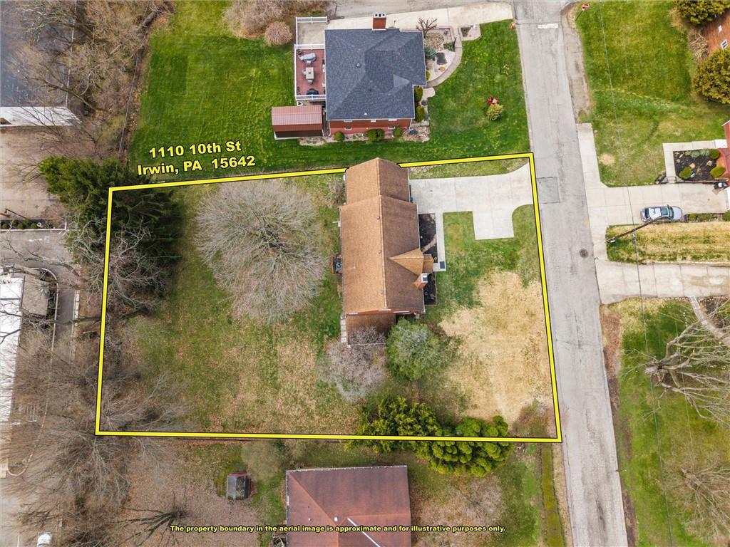 1110 10th Street Irwin, PA 15642 - Photo 40 of 50 aerial view of a house with a yard