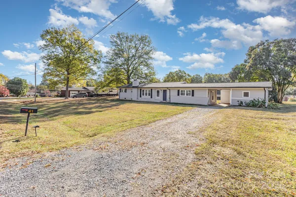a view of a house with swimming pool