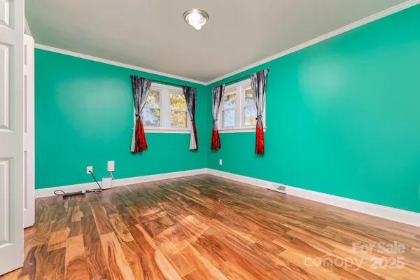 a view of a room with a backyard