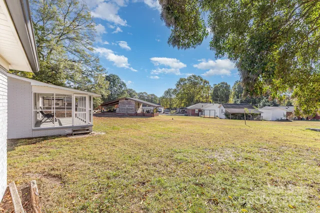 a view of a yard with an outdoor space