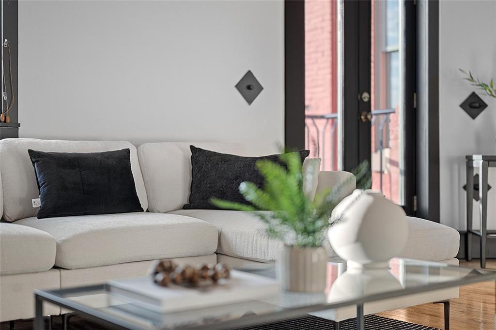 3080 Smallman Street Pittsburgh, PA 15201 - Photo 11 of 48 a living room with furniture flowerpot and wooden floor