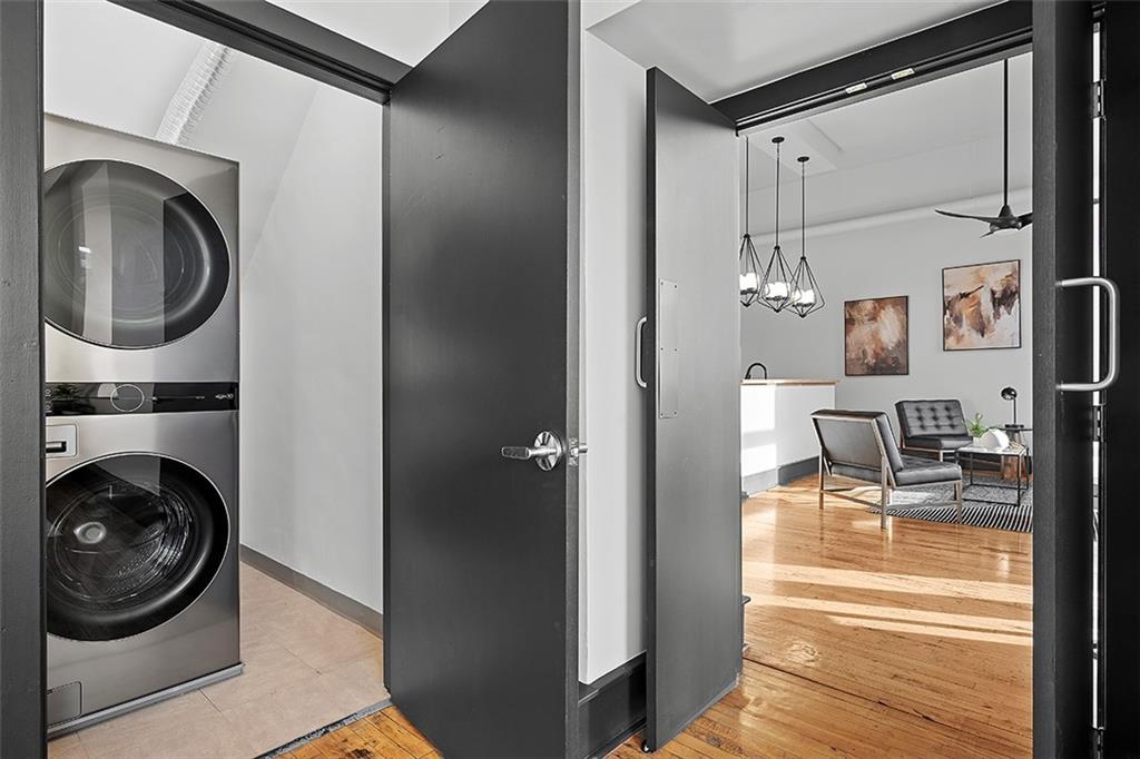 3080 Smallman Street Pittsburgh, PA 15201 - Photo 30 of 48 a view of a hallway with washer and dryer